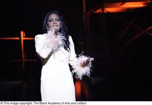 Primary view of object titled '[Actress performs solo in Aretha: The Musical]'.