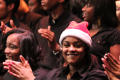 Primary view of [Choir member smiling at the camera]