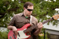 Thumbnail image of item number 1 in: '[Bassist performing at Grad Block Party]'.