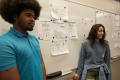 Photograph: [Two students presenting projects in Bill Ford's class]