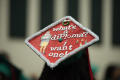 Photograph: [Decorated Mortarboard Cap with Buddy the Elf]