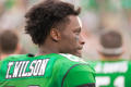 Photograph: [Tyler Wilson on the sidelines during UNT Homecoming game]