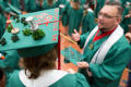 Thumbnail image of item number 1 in: '[Undergraduate Student Wearing Decorated Cap at Commencement Ceremony]'.