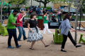 Photograph: [Block Party attendees dancing to musicians]