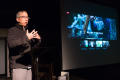 Photograph: [Tom Huang on stage at Heart of Mexico event]