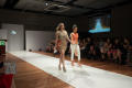 Photograph: [Design students wearing their creations down runway]