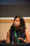 Photograph: [Yvonne Leow speaking on panel about web-based storytelling]