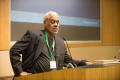 Photograph: [Charles Johnson speaking from podium during keynote]
