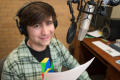 Primary view of [NT Daily Radio student sitting behind mic]