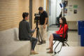 Photograph: [NT Daily TV students conducting interview]