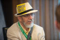Primary view of [Jeffrey Weiss wearing hat with note attached]