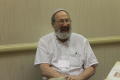 Photograph: [Rabbi David Zaslow sitting down]