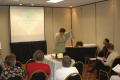 Photograph: [Linda Corey giving presentation at CSLA conference]