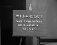 Photograph: [Advertisement for W.J. Hancock Paint and Wallpaper Co]