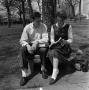Photograph: [Unknown man and woman viewing a book, 4]