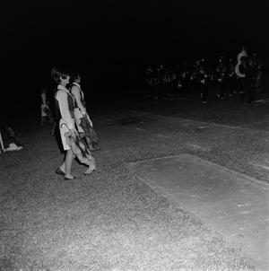 Primary view of object titled '[NTSU dancers on the sidelines]'.