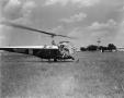 Photograph: [Margaret McDonald in a helicopter]
