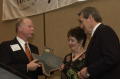 Primary view of [Donnis Baggett presenting an award to Phillip A. Berkebile]