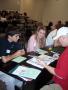 Photograph: [Attendees working on Mentor activity]