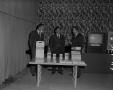 Photograph: [3 men pictured with Spectracide products]