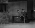 Photograph: [Bobbie showing an RCA television]