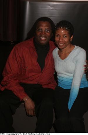 Primary view of object titled '[Curtis King poses with LisaGay Hamilton]'.