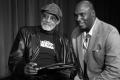 Primary view of [Photograph of a man posing with Melvin Van Peebles]