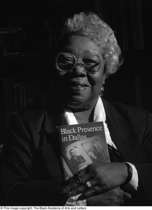 Primary view of object titled '[Author Sadye Gee with her book Black Presence in Dallas #3]'.