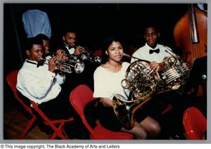 Primary view of object titled '[Photograph of students with french horns and trumpets]'.