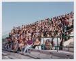 Photograph: [Photograph of TAMS students groups posing on UNT stadium bleachers]