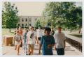 Photograph: [Photograph of TAMS group walking on campus]