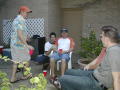 Primary view of [Guest gathered on the deck at pool party]