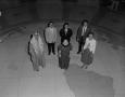 Photograph: [Six students standing on floor map]