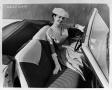 Photograph: [Woman in an automobile]