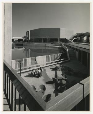 Primary view of object titled '[Photograph of people sitting outside of Richland College]'.