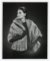 Photograph: [Photograph of a model dressed in a fur coat]