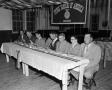 Photograph: [Doc Rhuman seated at FFA Boys banquet]