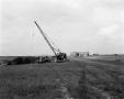 Photograph: [Photograph of crane and tower in field]