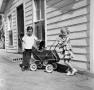 Photograph: [Timothy and Carol with a Stroller]
