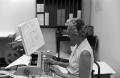 Photograph: [Employee using a word processor]