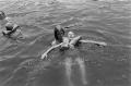 Photograph: [Children swimming in a lake]