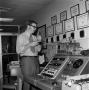 Photograph: [Unknown man in the WABP control room]