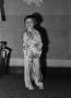 Photograph: [Photograph of a child posing in a silk outfit #2]