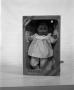 Photograph: [African American toy in box]