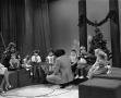 Photograph: [Photograph of Bill Kelley and young children at a KXAS Christmas Chi…