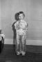 Photograph: [A child posing in a silk outfit #1]
