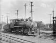 Photograph: [Photograph of a locomotive on the tracks]