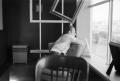 Photograph: [Photograph of Charles Williams looking out a window]