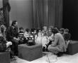 Photograph: [Photograph of Bill Kelley interviewing children at a KXAS Christmas …