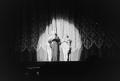 Photograph: [Photograph of a man performing on stage]